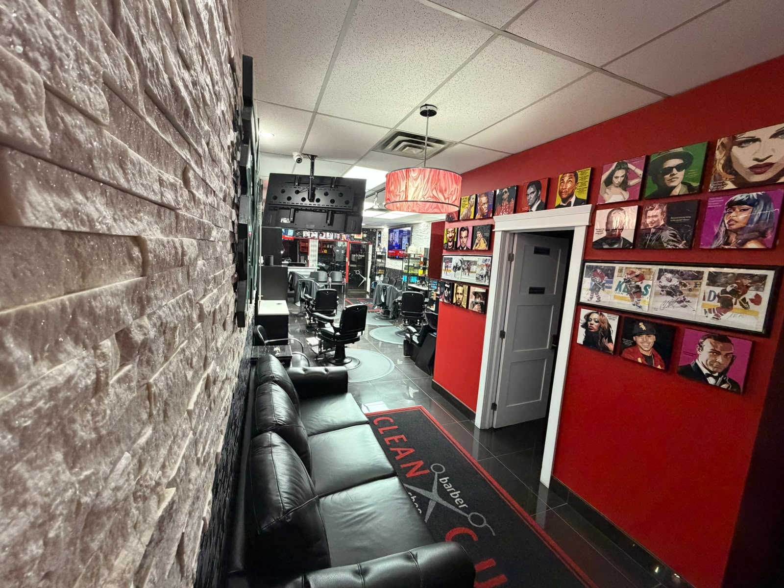 Pop culture wall art and lounge at Clean Cut