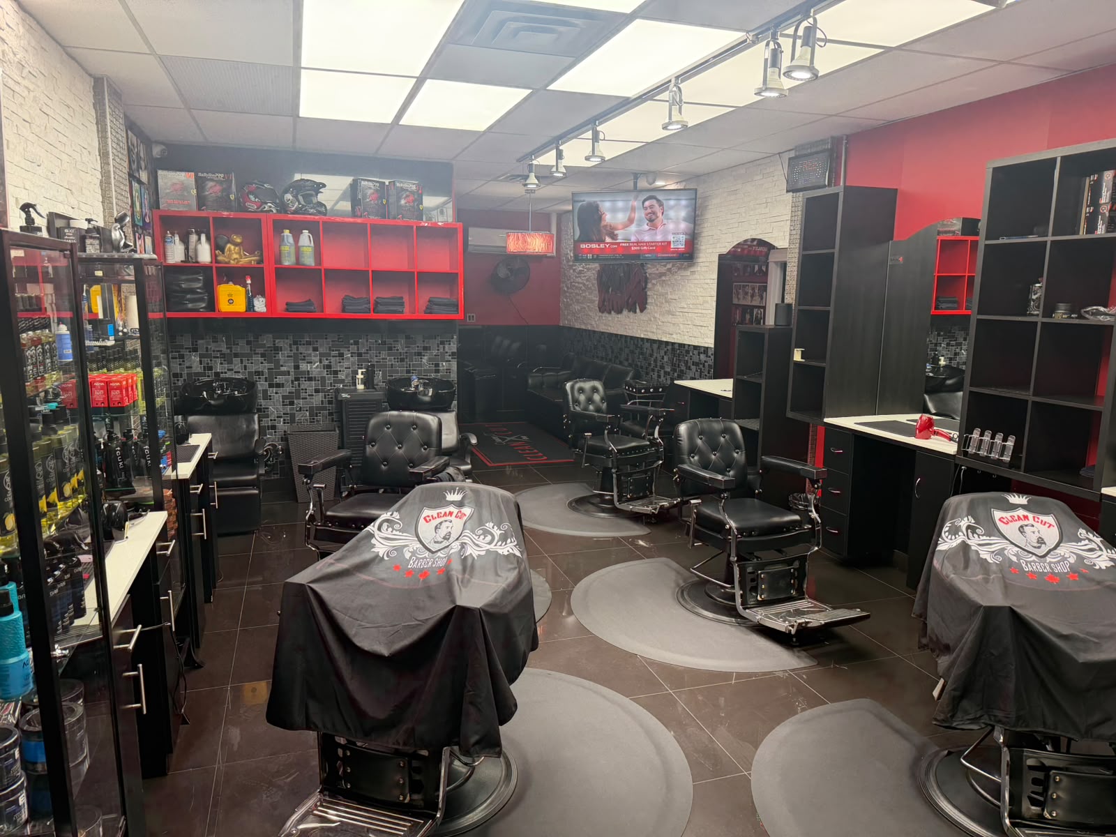 Inside Clean Cut Barber Shop — chairs and stations